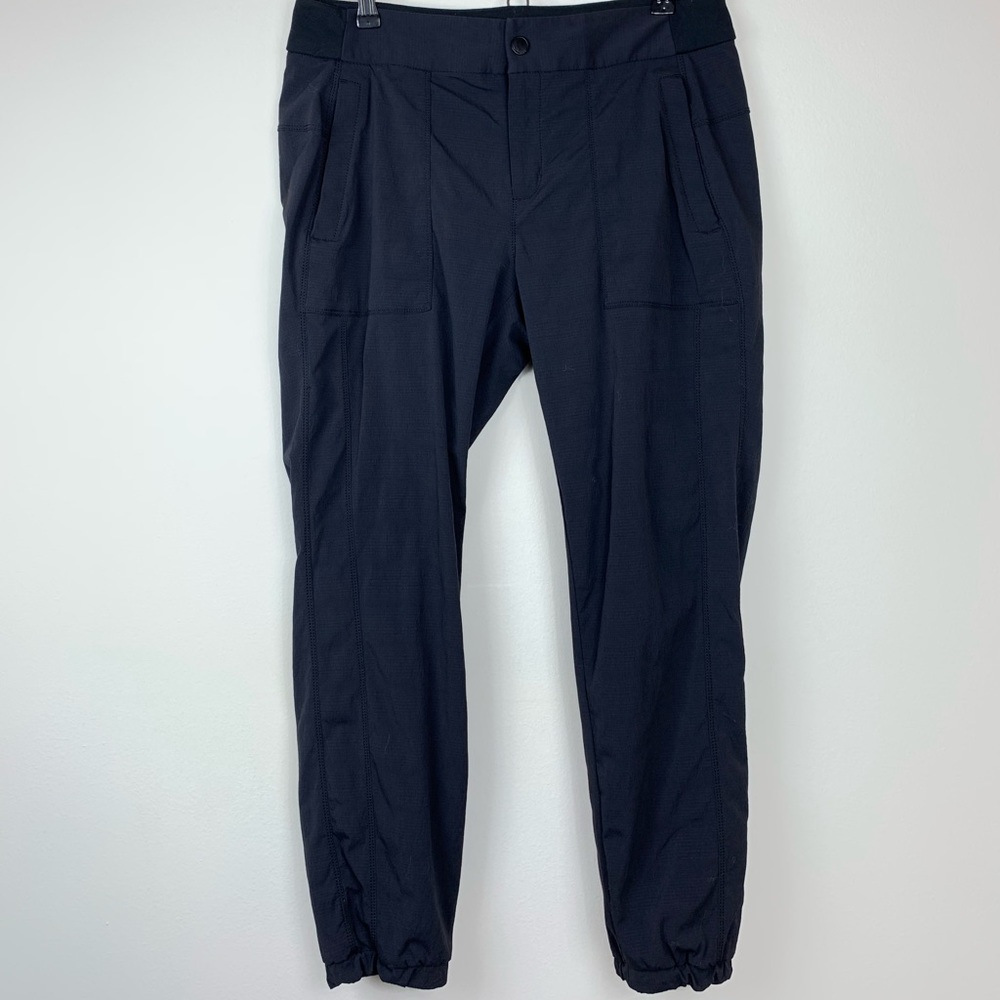 Athleta black pant joggers 12 button front